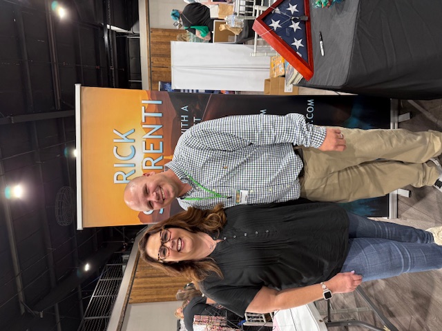 Rick Serrenti posing with another reader at the Books Books Books Event