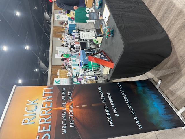 Rick Serrenti banner and author table at the Books Books Books Event